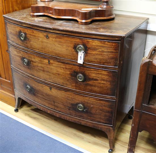 A Regency mahogany bow-fronted chest fitted three long drawers W.100cm